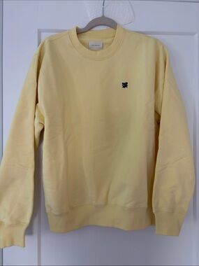Aime Leon Dore “Crest” crewneck in “mellow yellow”